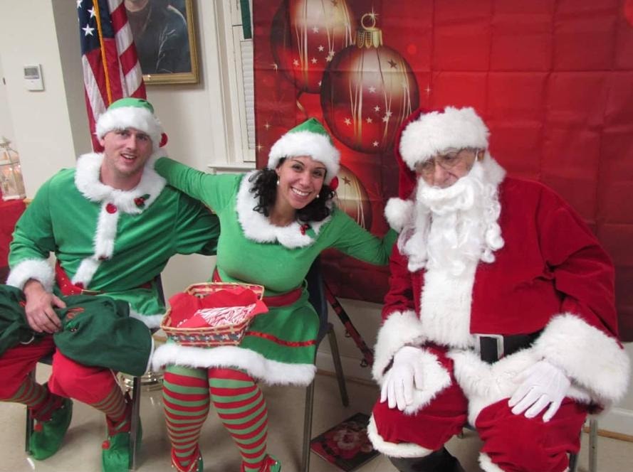 Elves and Santa at the holiday party